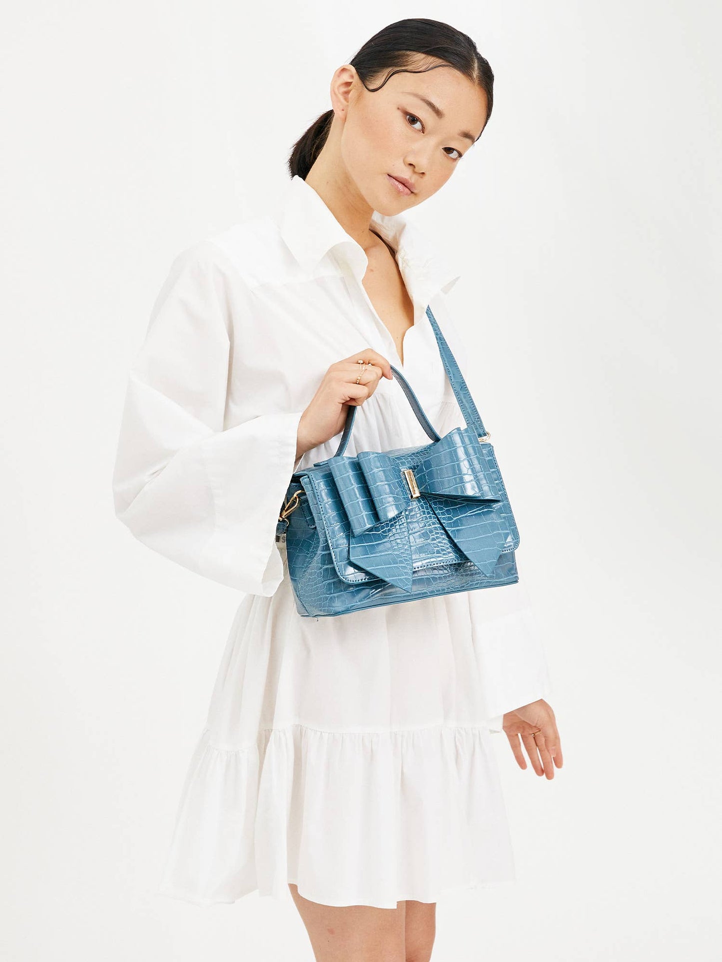 Celia Double Bowtie Embossed Crossbody: Cognac