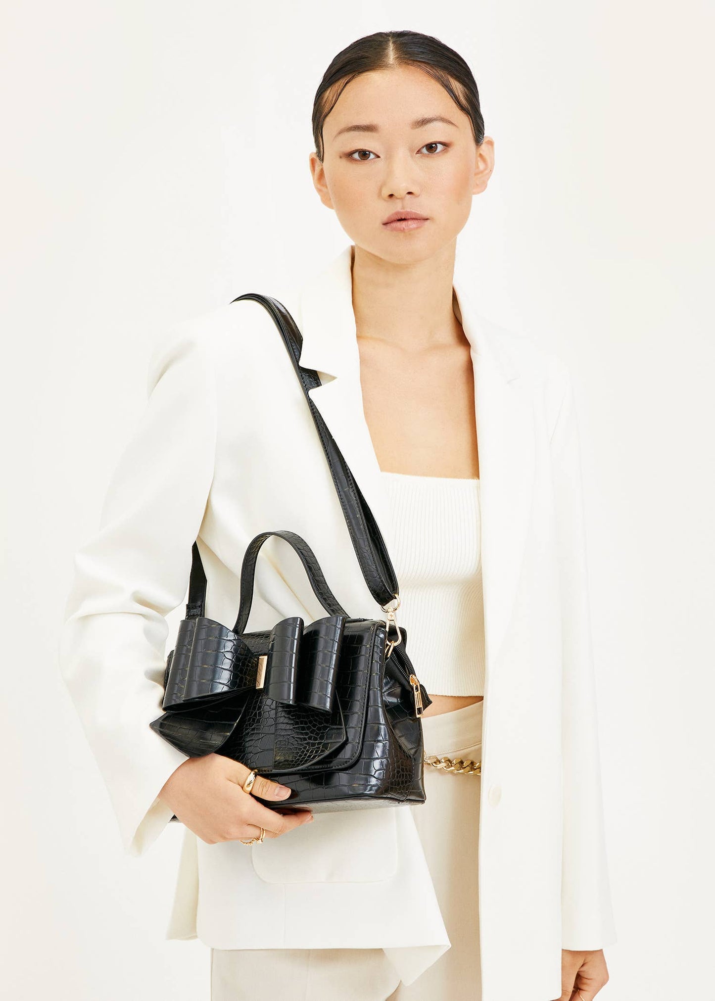 Celia Double Bowtie Embossed Crossbody: Cognac