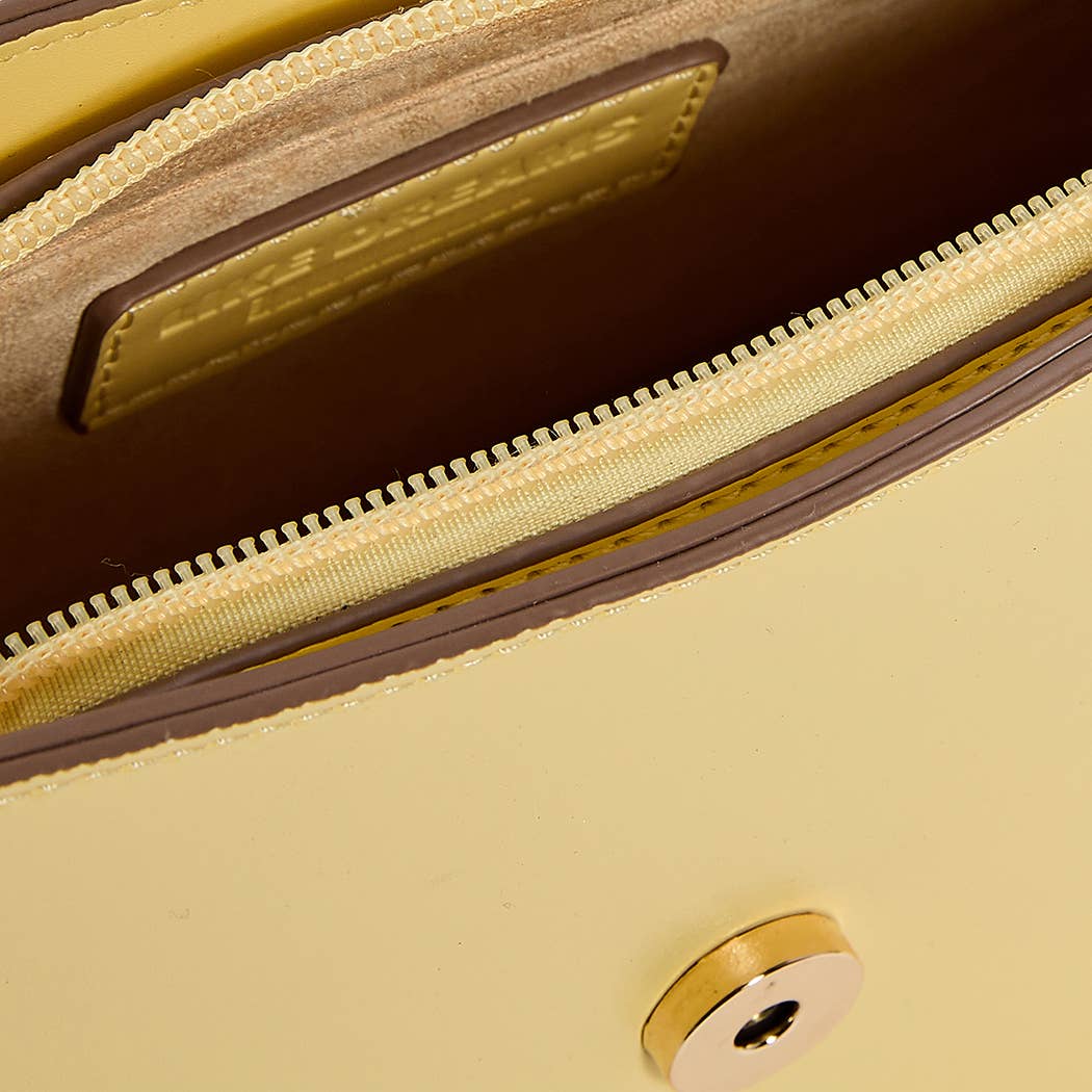 Alexis Vintage Buckle Shoulder Bag: Ivory